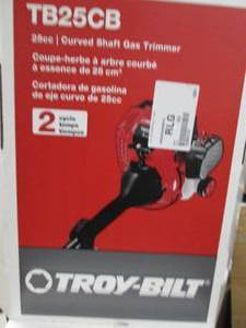 lot 265 image: troy bilt 25cc curved shaft gas tri...