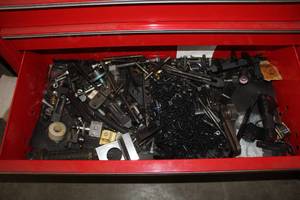 lot 1085 image: Lot of (1 Drawer) Hold Downs, Hold Down Bolts, Mill Pieces