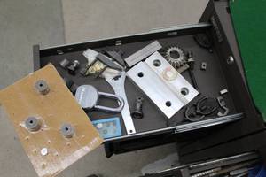 lot 1067 image: Lot of (1 Drawer) Grinding Wheels, Cutters, Alignment Blocks, Vee Block Clamps, Misc. Tools