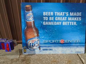NOS Miller Lite sports center tin sign. 30 x 24. As shown.