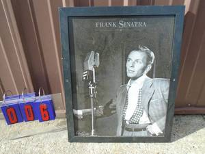 Frank Sinatra picture in wood frame. 18 x 22. As shown.