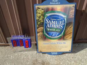 Sam Adams white ale. Wood back with plastic front. 24 x 15. As shown.