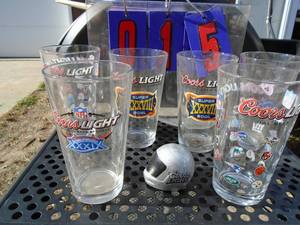 Qty of 6 Coors Light football glasses with mini helmet. As shown.