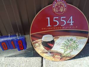 NOS New Belgium 1554 tin sign. 19 diameter. As shown.