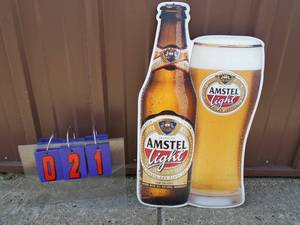NOS Amstel Light tin sign. 13 x 23. As shown.