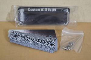 lot 128 image: Guuun Custom G10 Gun Grips