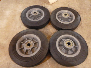 lot 56 image: 4 Hard Rubber Utility Tires