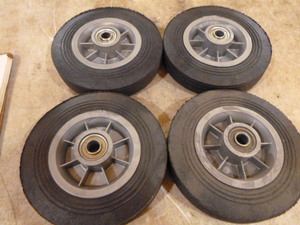 lot 57 image: 4 Hard Rubber Utility Tires