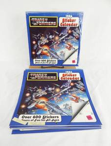 lot 72 image: Set of 11 Vintage 1986 2025 Transformers Sticker Calendars