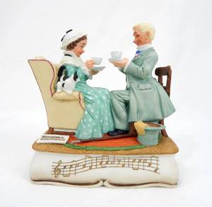 lot 68 image: Vintage Norman Rockwell Gaily Sharing Vintage Times Musical Figurine