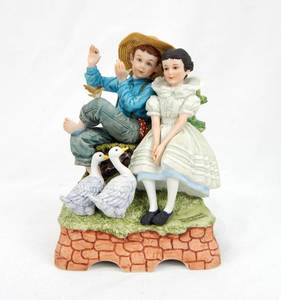 lot 69 image: Vintage Norman Rockwell Sweet Song So Young Musical Figurine