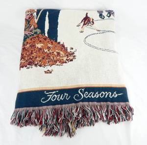 lot 39 image: Vintage Crown Crafts Inc. Norman Rockwell Four Seasons Triple Woven Blanket