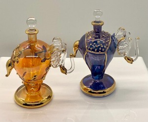 lot 11 image: Four Elephant Figurine Dabber Bottles