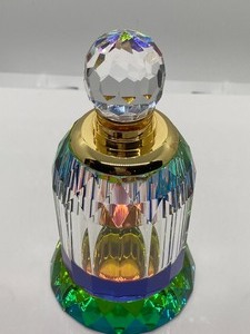 lot 292 image: Prism Cut Multi Colored Dabber Bottle