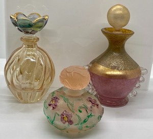 lot 254A image: Three Decorative Vanity Bottles