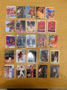 lot 124 image: (25) Michael Jordan Cards THE GOAT LK