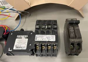 lot 22 image: Lot of Electrical Supplies Breakers Flashlights and Tools