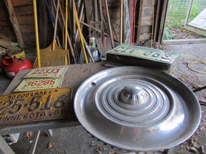 lot 60 image: Vintage Hub Cap - Plates