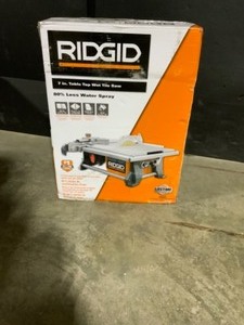 RIDGID 6.5 Amp Corded 7 in. Table Top Wet Tile Saw. See Pictures
