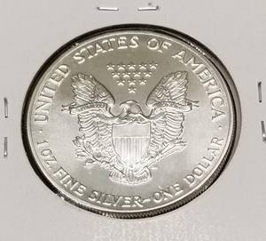 1986 AMERICAN SILVER EAGLE 1 TROY OZ .999 FINE SILVER DOLLAR