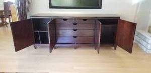 lot 18 image: Barbara Barry for Baker Furniture Mahogany Buffet with Four Louvered Doors