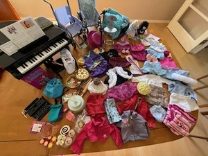 lot 55 image: HUGE Selection of American Girl Outfits and Accessories
