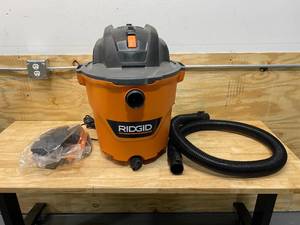RIDGID 12 Gal. 5.0-Peak HP NXT WetDry Shop Vacuum with Filter and Hose.