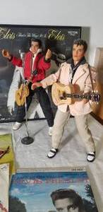 lot 76 image: Collection of Elvis Presley Dolls, 45 Records and LP