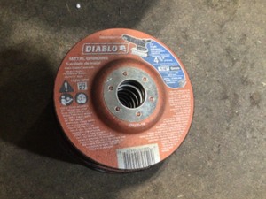 lot 1 image: DIABLO 4-12 in. x14 in. x78 in. Metal Grinding Disc with Depressed Center (10-Pack)
