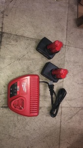 lot 19 image: Milwaukee M12 12-Volt Lithium-Ion Starter Kit with Two 6.0 Ah Battery Packs and Charger