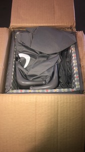 lot 30 image: Grace pack and play on the go placard, includes full-size infant bassinet push button compact fold