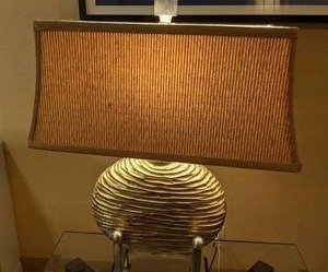 lot 21 image: Elegant Table Lamp with Oversized Rectangular Shade and Gold Textured Based