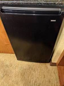 lot 45 image: Black Kenmore Mini Fridge