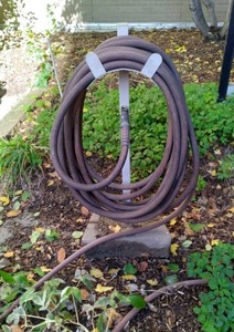 lot 147 image: Heavy Duty Hose w Home Made Stand