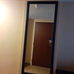 lot 549 image: Long Black Wall Mirror