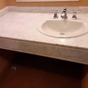 lot 796 image: Marbleized White Bathroom Counter with Sink