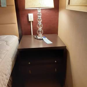 lot 805 image: Large Wood Nightstand and Clear Bubble Table Lamp