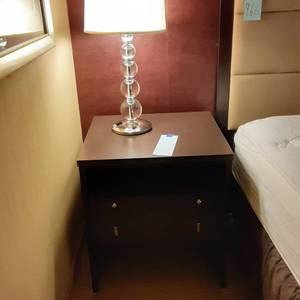 lot 965 image: Dark Wood Nightstand and Clear Bubble Table Lamp
