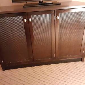 lot 1045 image: Sturdy Dark Brown 3-Door CabinetTV Stand