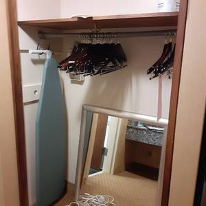 lot 502 image: Mixed Lot Wooden Hangers, Ironing Board, Iron, Bathroom Mirror, & 2 Extension Cords