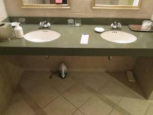 lot 120 image: Beautiful Large Bathroom Counter with Duel Sinks & Misc. Items