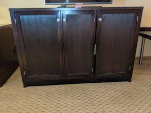 lot 638 image: Stately Wood 3-Door CabinetTV Stand