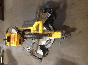 FLEXVOLT 120-Volt MAX Cordless Brushless 12 in. Miter Saw with used NOt working ,only for parts or repair