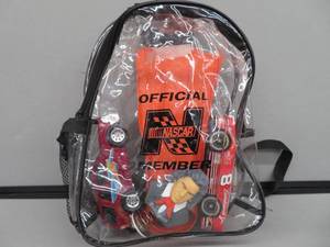 lot 128 image: NASCAR COLLECTABLE BACK PACK WITH GOODIES.