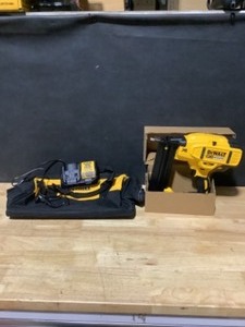 DEWALT 20-Volt MAX XR Lithium-Ion Cordless 18-Gauge Brad Nailer (Tool-Only). See Pictures