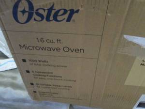 Oster 1.6 Cu. Ft. 1000-Watt Counter...