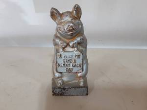 lot 11 image: Cast Iron A Wise Pig Coin Bank