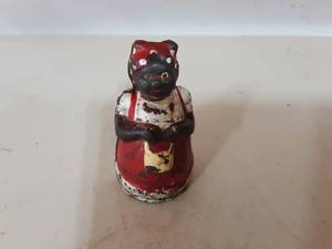 lot 17 image: Cast Iron Aunt Jemima Coin Bank 3 Tall