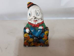 lot 18 image: Vintage Cast Iron Humpty Dumpty Coin Bank 5 Tall