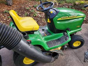 lot 1 image: John Deere LT155 Riding Lawn Mower with Rear Bagger & Snow Removal Attachment